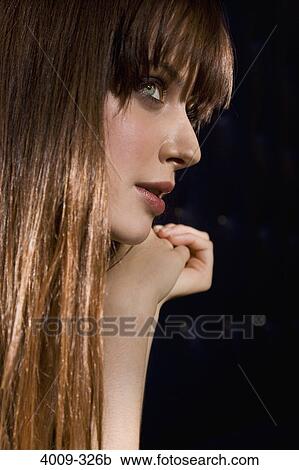 Stock Image - Close-up of a woman posing. Fotosearch