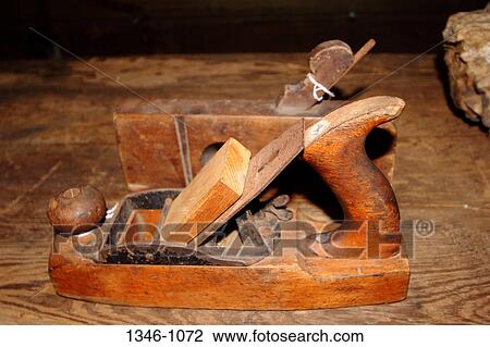 Close-up of an antique wooden hand tool for planing wood View Large Photo Image Stock Image - Close-up of an antique wooden hand tool for planing wood. Fotosearch