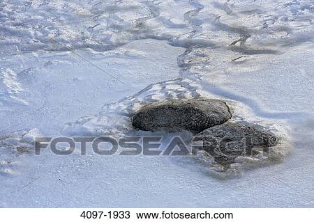 Close-up of snow on rocks in winter, Jasper National Park, Alberta, Canada View Large Photo Image Stock Image - Close-up of snow on rocks in winter, Jasper National Park, Alberta, Canada. Fotosearch