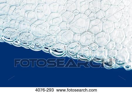Close-up of soap suds in water View Large Photo Image Stock Image - Close-up of soap suds in water. Fotosearch