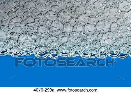 Close-up of soap suds in water View Large Photo Image Stock Image - Close-up of soap suds in water. Fotosearch