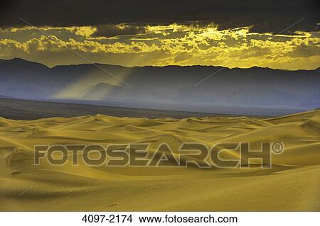 Clouds over mountain range, Panamint Range, Mesquite Flat Sand Dunes, Mojave Desert, Death Valley, Death Valley National Park, California, USA View Large Photo Image Picture - Clouds over mountain range, Panamint Range, Mesquite Flat Sand Dunes, Mojave Desert, Death Valley, Death Valley National Park, California, USA. Fotosearch