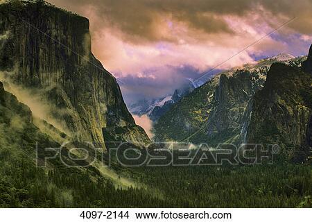 Clouds over mountains, El Capitan, Yosemite Valley, Yosemite National Park, California, USA View Large Photo Image Picture - Clouds over mountains, El Capitan, Yosemite Valley, Yosemite National Park, California, USA. Fotosearch