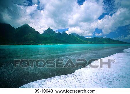 Stock Image - Clouds over mountains, Moorea, Tahiti, French Polynesia. Fotosearch