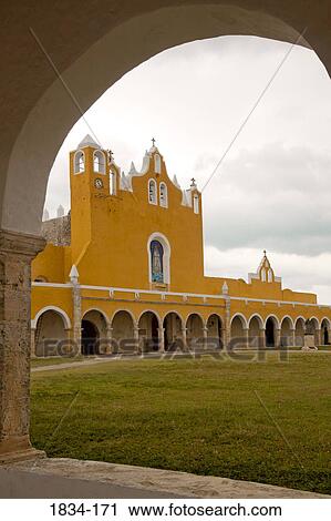 Stock Image - Convent viewed through an arch, Convento De San Antonio De Padua, Izamal, Yucatan, Mexico. Fotosearch
