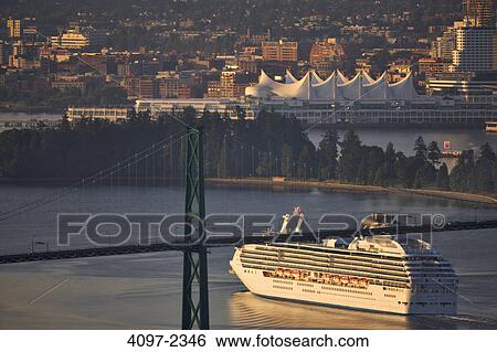 Cruise ship passing under a suspension bridge, Lions Gate Bridge, Vancouver, British Columbia, Canada View Large Photo Image Stock Photograph - Cruise ship passing under a suspension bridge, Lions Gate Bridge, Vancouver, British Columbia, Canada. Fotosearch