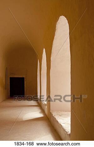 Stock Photo - Door at the end of corridor in a church, Convento De San Antonio De Padua, Izamal, Yucatan, Mexico. Fotosearch