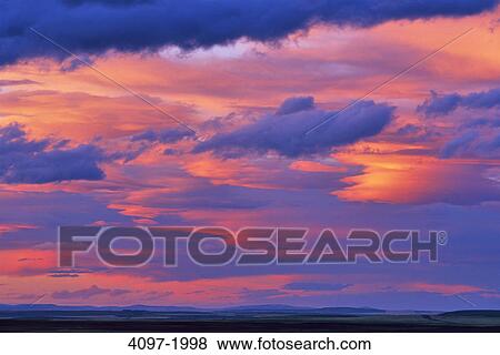 Dramatic sky over a landscape, Alberta, Canada View Large Photo Image Stock Photo - Dramatic sky over a landscape, Alberta, Canada. Fotosearch
