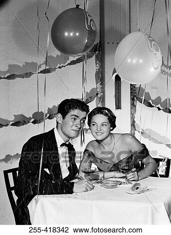 Stock Image - Elegance couple at party. Fotosearch