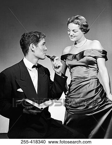 Stock Image - Elegance couple wearing evening clothes. Fotosearch