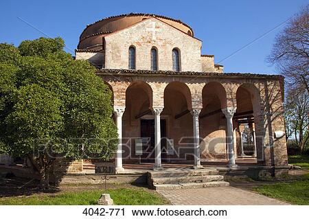 Stock Image - Facade of a church, Santa Fosca Church, Torcello, Venice, Veneto, Italy. Fotosearch