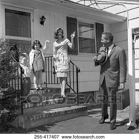 Stock Photo - Family saying goodbay to father. Fotosearch