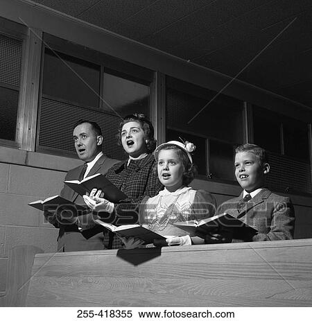 Family singing in church View Large Photo Image Stock Photography - Family singing in church. Fotosearch