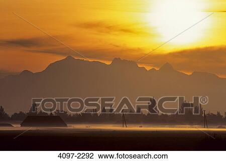 Farm covered with fog at sunrise, Fraser Valley, British Columbia, Canada View Large Photo Image Stock Image - Farm covered with fog at sunrise, Fraser Valley, British Columbia, Canada. Fotosearch