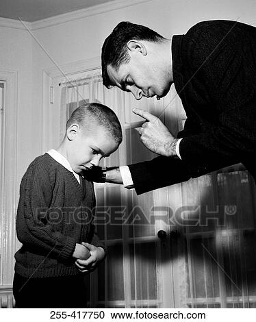 Father telling son off View Large Photo Image Stock Image - Father telling son off. Fotosearch