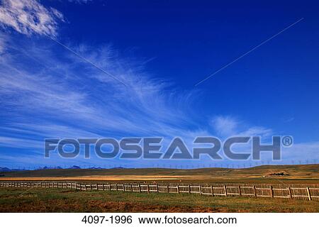 Stock Photograph - Fence in a field, Alberta, Canada. Fotosearch
