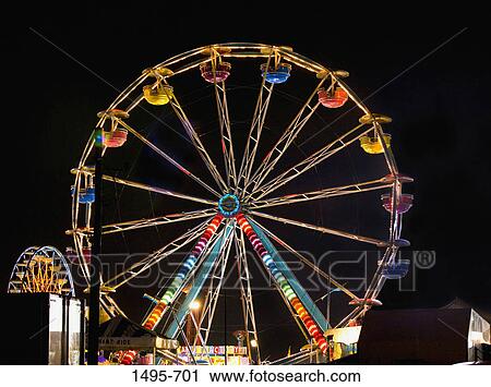 Stock Image - Ferris wheel lit up at night, 74th Annual Sarasota County Fair, Sarasota, Sarasota County, Florida, USA. Fotosearch