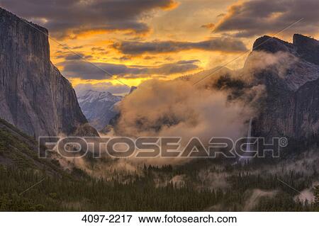 Stock Photo - Fog over mountains, Yosemite National Park, California, USA. Fotosearch