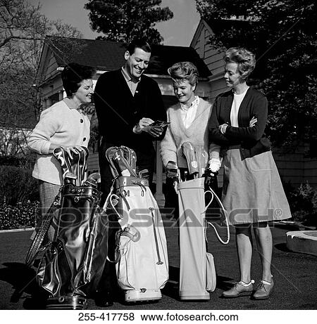 Stock Photo - Friends gathered to play golf. Fotosearch