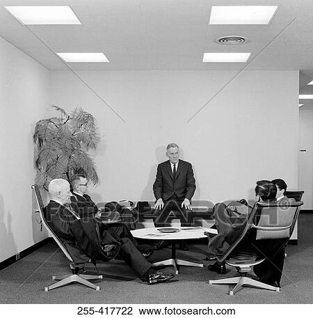 Group of businessmen at meeting View Large Photo Image Stock Image - Group of businessmen at meeting. Fotosearch