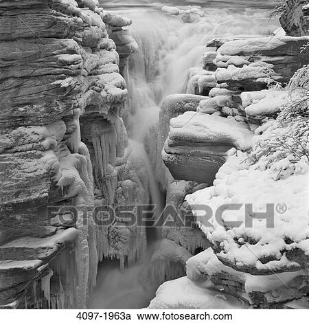 High angle view of a frozen waterfall, Athabasca Falls, Jasper National Park, Alberta, Canada View Large Photo Image Stock Image - High angle view of a frozen waterfall, Athabasca Falls, Jasper National Park, Alberta, Canada. Fotosearch