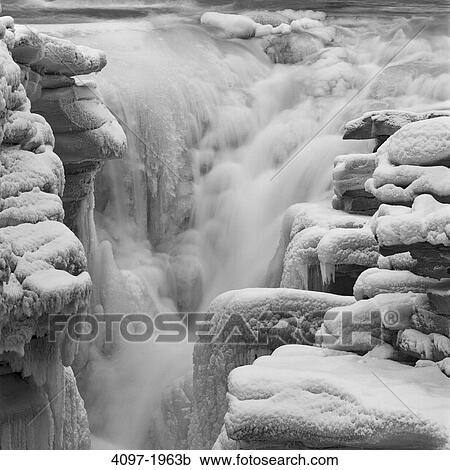 High angle view of a frozen waterfall, Athabasca Falls, Jasper National Park, Alberta, Canada View Large Photo Image Stock Image - High angle view of a frozen waterfall, Athabasca Falls, Jasper National Park, Alberta, Canada. Fotosearch
