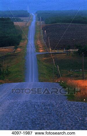 Highway passing through a landscape, Alberta, Canada View Large Photo Image Stock Photo - Highway passing through a landscape, Alberta, Canada. Fotosearch