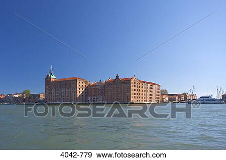 Hotel at the waterfront, Hilton Molino Stucky Hotel, Giudecca, Venice, Veneto, Italy View Large Photo Image Stock Photo - Hotel at the waterfront, Hilton Molino Stucky Hotel, Giudecca, Venice, Veneto, Italy. Fotosearch