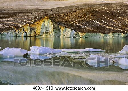 Icebergs in a lake with a mountain in the background, Angel Glacier, Mt Edith Cavell, Jasper National Park, Alberta, Canada View Large Photo Image Stock Image - Icebergs in a lake with a mountain in the background, Angel Glacier, Mt Edith Cavell, Jasper National Park, Alberta, Canada. Fotosearch