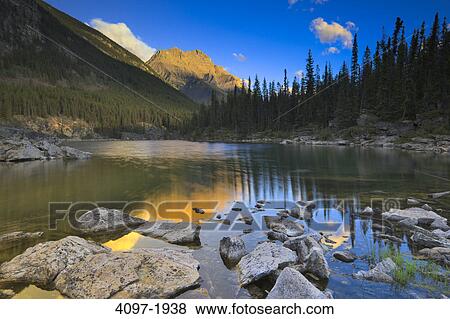 Lake with a mountain in the background, Horseshoe Lake, Mt Kerkeslin, Jasper National Park, Alberta, Canada View Large Photo Image Stock Photo - Lake with a mountain in the background, Horseshoe Lake, Mt Kerkeslin, Jasper National Park, Alberta, Canada. Fotosearch