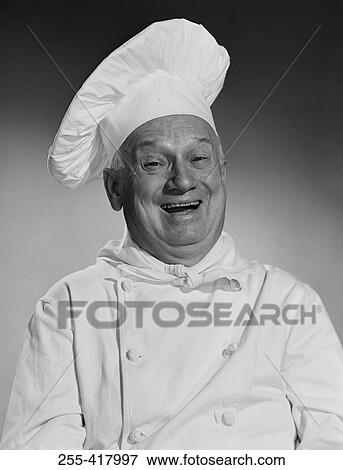 Laughing mature chef View Large Photo Image Stock Photo - Laughing mature chef. Fotosearch
