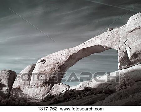 Low angle view of a natural arch, Arches National Park, Utah, USA View Large Photo Image Stock Image - Low angle view of a natural arch, Arches National Park, Utah, USA. Fotosearch