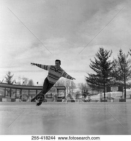 Picture - Man iceskating. Fotosearch