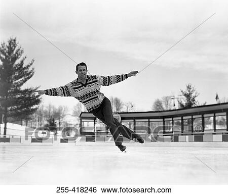 Stock Photograph - Man iceskating. Fotosearch