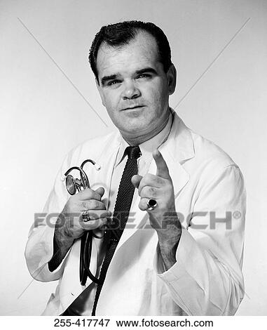 Stock Photo - Mature male doctor portrait. Fotosearch