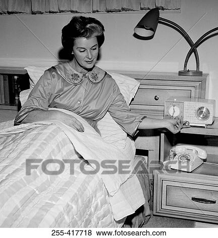 Mature woman getting up View Large Photo Image Stock Photo - Mature woman getting up. Fotosearch