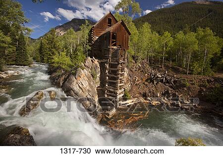 Stock Image - Mill near a waterfall, Crystal Mill, Crystal, White River National Forest, Gunnison County, Colorado, USA. Fotosearch