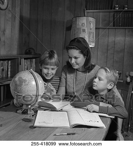 Mother with sons doing homework View Large Photo Image Stock Photo - Mother with sons doing homework. Fotosearch