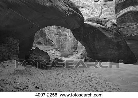 Natural arch in a canyon, Arches National Park, Utah, USA View Large Photo Image Stock Photo - Natural arch in a canyon, Arches National Park, Utah, USA. Fotosearch