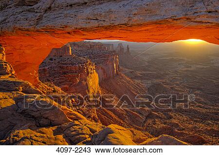 Natural arch in a canyon, Mesa Arch, Island In The Sky, Canyonlands National Park, Utah, USA View Large Photo Image Stock Image - Natural arch in a canyon, Mesa Arch, Island In The Sky, Canyonlands National Park, Utah, USA. Fotosearch