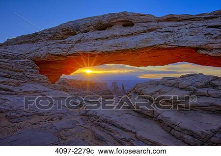 Natural arch in a canyon, Mesa Arch, Island In The Sky, Canyonlands National Park, Utah, USA View Large Photo Image Stock Image - Natural arch in a canyon, Mesa Arch, Island In The Sky, Canyonlands National Park, Utah, USA. Fotosearch
