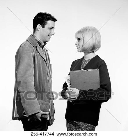 Pair of university students talking View Large Photo Image Picture - Pair of university students talking. Fotosearch