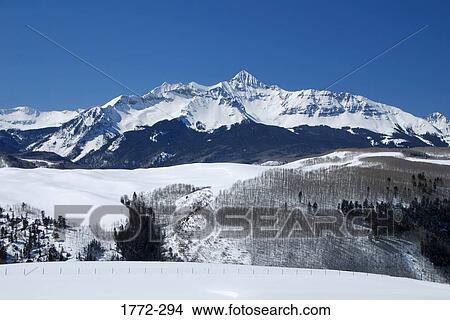Panoramic view of snow covered mountains, Rocky Mountains, USA View Large Photo Image Picture - Panoramic view of snow covered mountains, Rocky Mountains, USA. Fotosearch