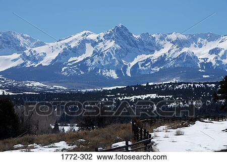 Panoramic view of snow covered mountains, Rocky Mountains, USA View Large Photo Image Stock Image - Panoramic view of snow covered mountains, Rocky Mountains, USA. Fotosearch
