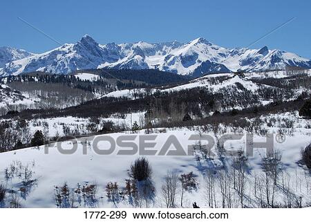 Panoramic view of snow covered mountains, Rocky Mountains, USA View Large Photo Image Stock Photo - Panoramic view of snow covered mountains, Rocky Mountains, USA. Fotosearch