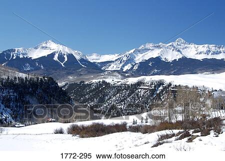 Panoramic view of snow covered mountains, Rocky Mountains, USA View Large Photo Image Stock Photography - Panoramic view of snow covered mountains, Rocky Mountains, USA. Fotosearch