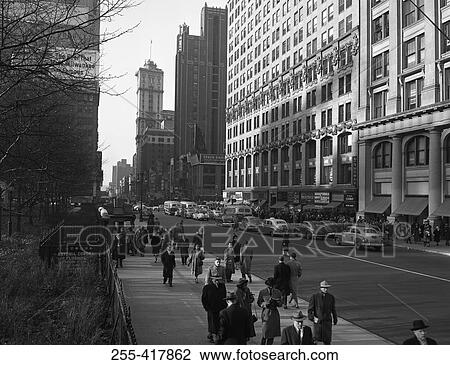 Pedestrians on sidewalk View Large Photo Image Stock Image - Pedestrians on sidewalk. Fotosearch