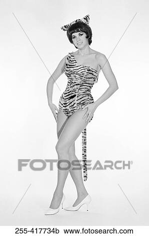 Pin-up girl dressed up as tiger View Large Photo Image Stock Image - Pin-up girl dressed up as tiger. Fotosearch