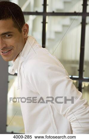 Portrait of a man smiling, Manhattan, New York City, New York State, USA View Large Photo Image Stock Photography - Portrait of a man smiling, Manhattan, New York City, New York State, USA. Fotosearch