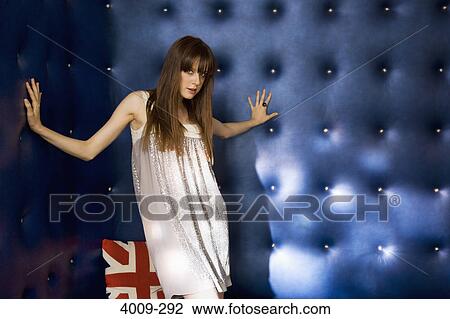 Stock Image - Portrait of a woman posing. Fotosearch